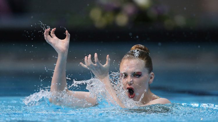 Synced Laughter: Exploring the Hilarious Side of Synchronized Swimming