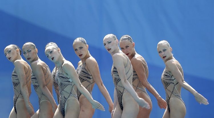 Synced Laughter: Exploring the Hilarious Side of Synchronized Swimming