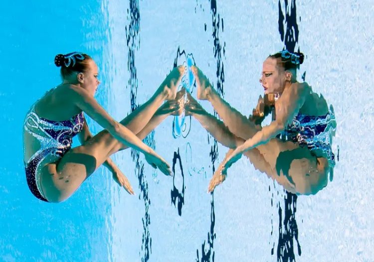 Synced Laughter: Exploring the Hilarious Side of Synchronized Swimming